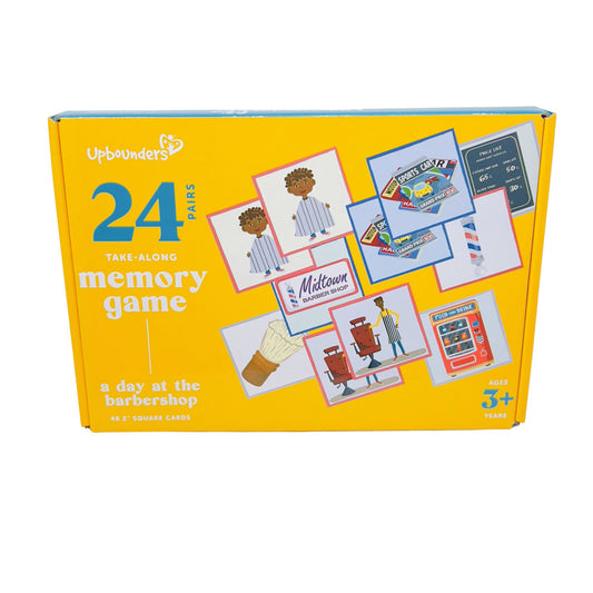 Upbounders A Day at the Barbershop memory game box with yellow cover showing 24 pairs of illustrated cards featuring barbershop-themed images, ages 3+