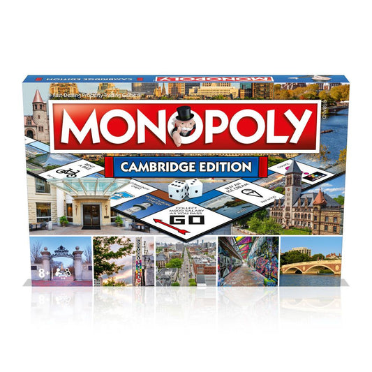 Monopoly Cambridge Edition board game box showing the game board with dice, property cards, and photographs of Cambridge landmarks including a castle, church, b