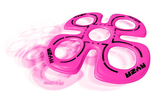 Bright magenta plastic boomerang with black curved line designs and oval cutouts, shown on plain background