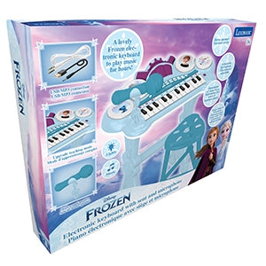 Frozen Melody Maker Electronic Piano Keyboard with Microphone packaged box showing keyboard, microphone, and sheet music accessories