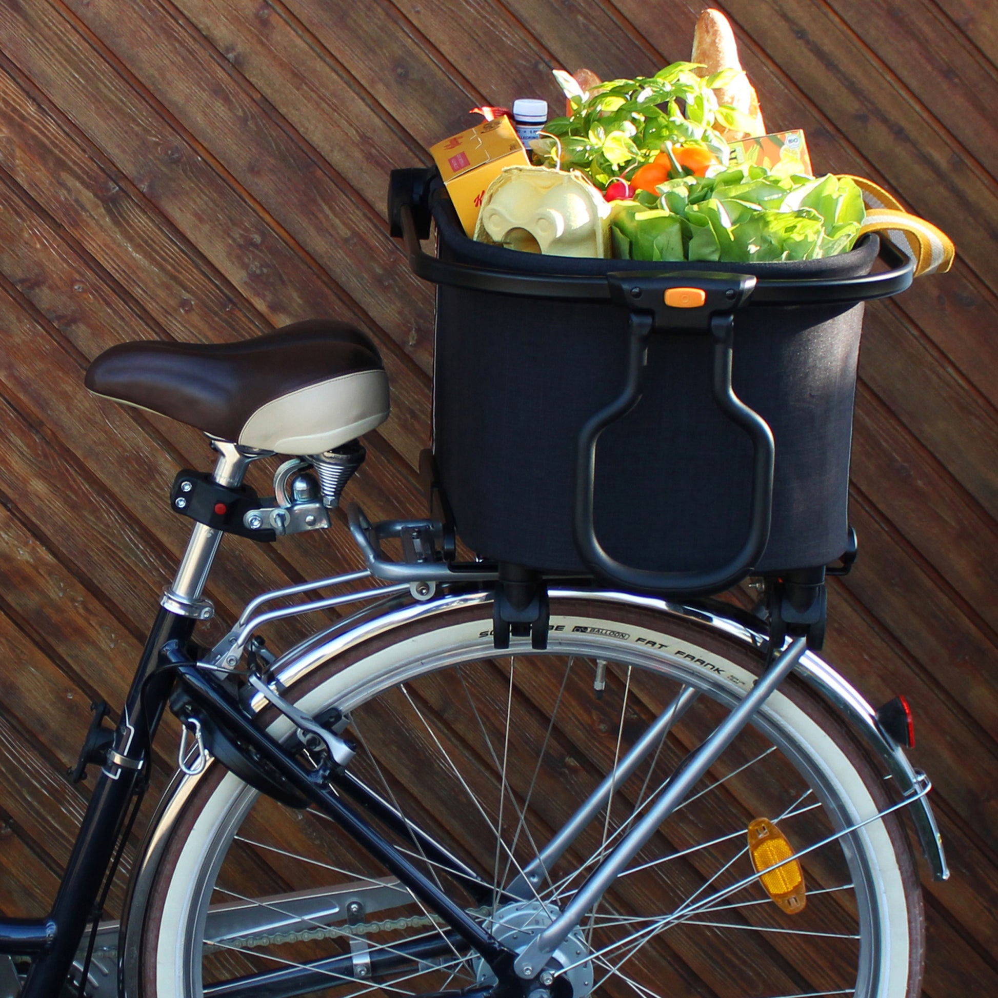 My Duque MULTI Bicycle Pannier Basket in melange black mounted on bike rear rack with groceries