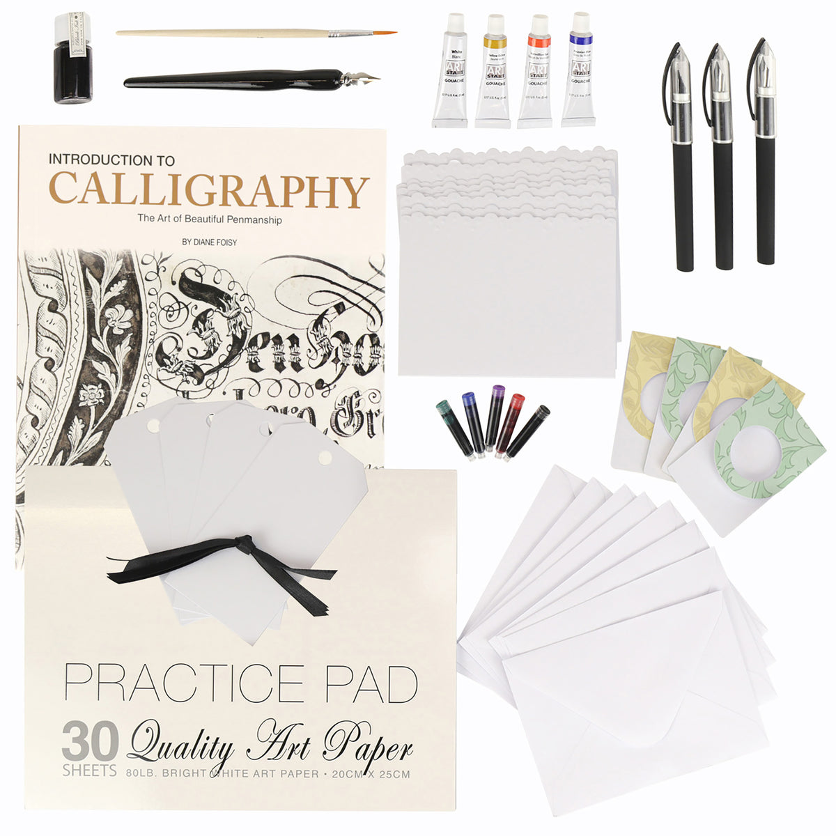 Introduction to Calligraphy kit with instruction book, pens, inks, practice pad, and stationery supplies displayed