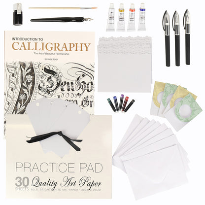Introduction to Calligraphy kit with instruction book, pens, inks, practice pad, and stationery supplies displayed