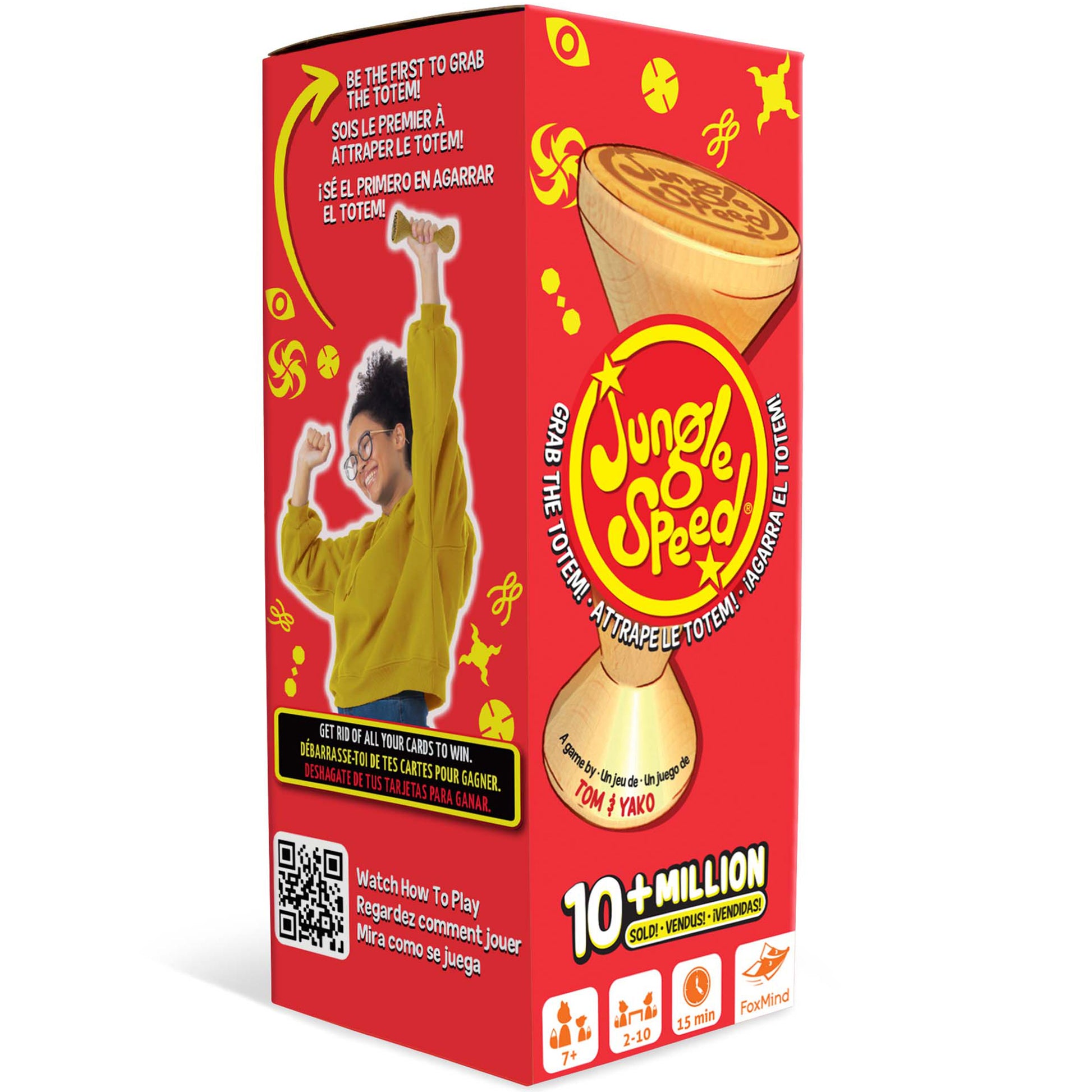 Jungle Speed card game box with red packaging, yellow totem, and player grabbing it