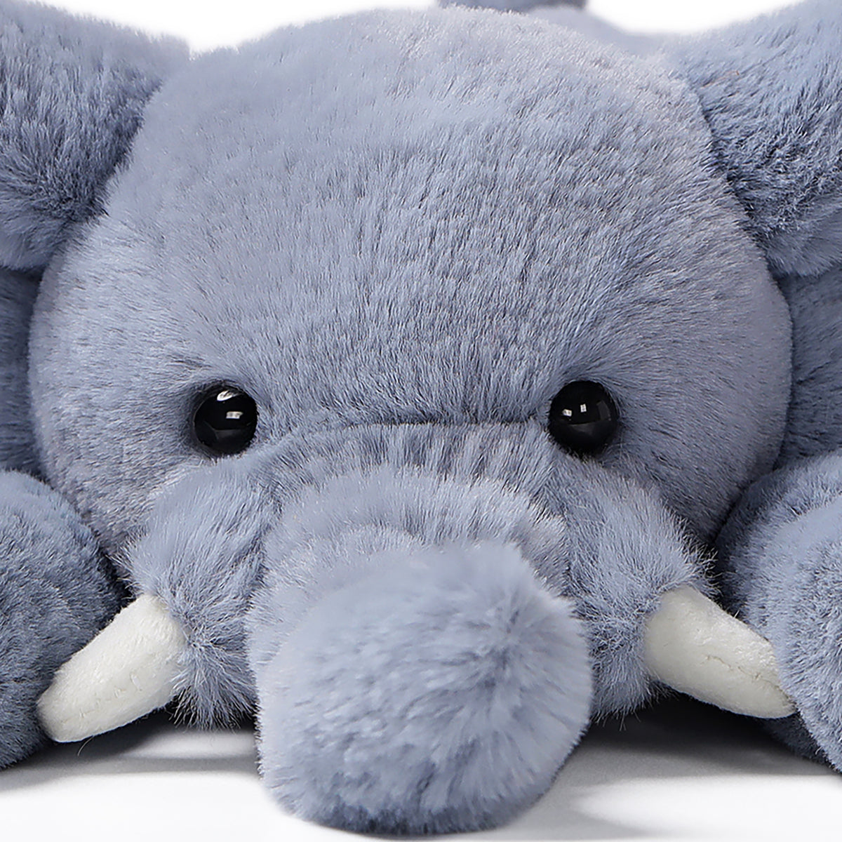 Lazy Series gray elephant 7-inch plush with black eyes and white tusks