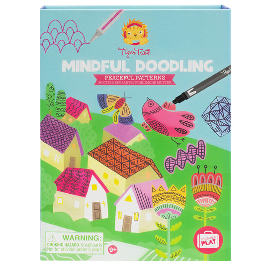 Tiger Tribe Mindful Doodling Peaceful Patterns activity kit box featuring colorful illustrated houses, birds, flowers, and geometric patterns with markers on tu