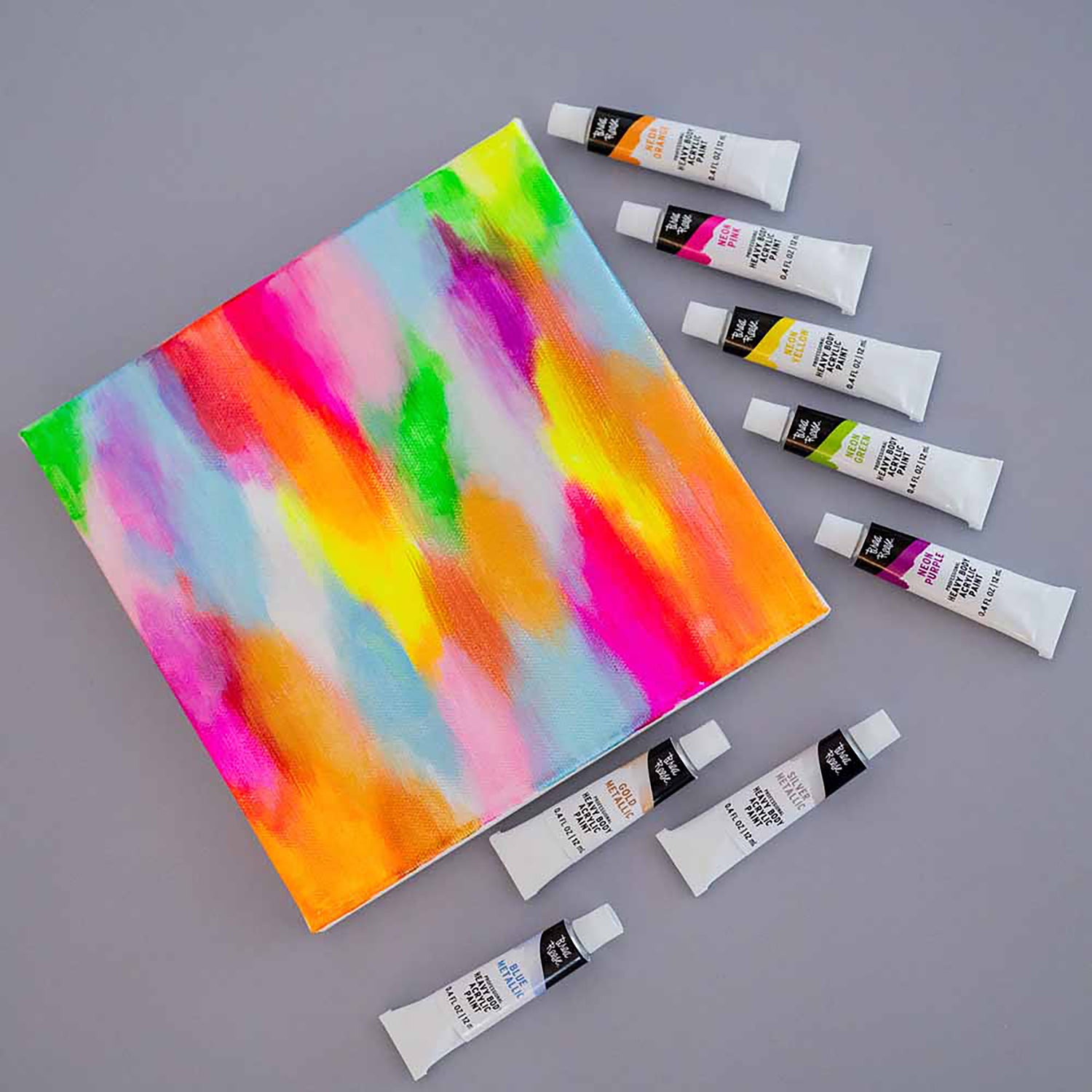 Professional Heavy Body Acrylic Paint Set 12ct with neon and metallic colors on canvas