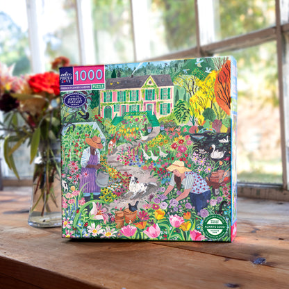 Piece&Love French Flower Garden 1000 piece puzzle box featuring colorful garden scene with house