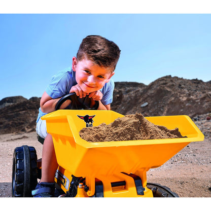 BIG Jim Dumper yellow ride-on tractor with boy playing in sandbox