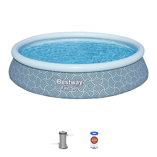 Bestway FastSet inflatable pool with blue and white geometric pattern, filled with water, shown with pump and filter cartridge