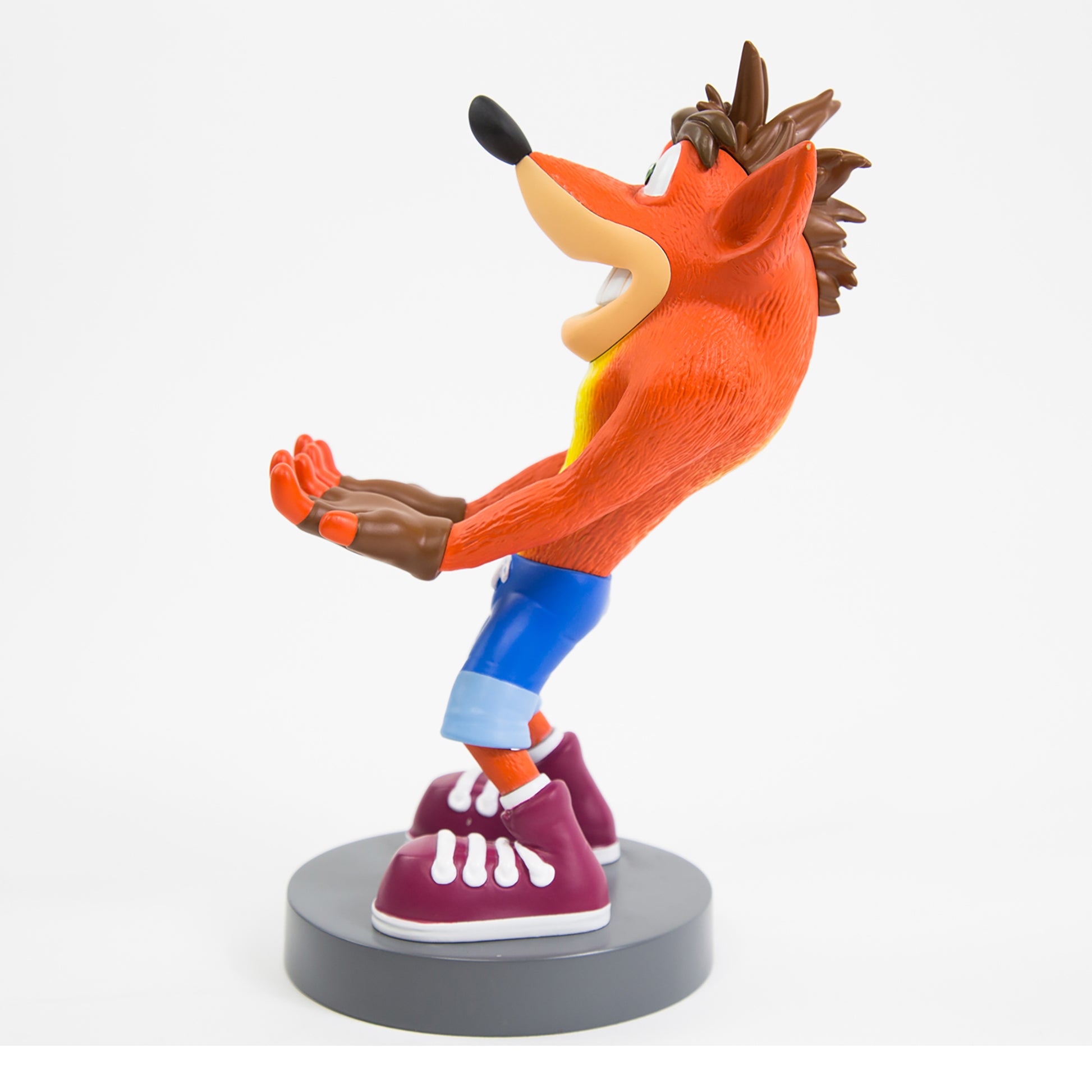 Crash Bandicoot Trilogy Cable Guys phone holder figure in orange, blue and red