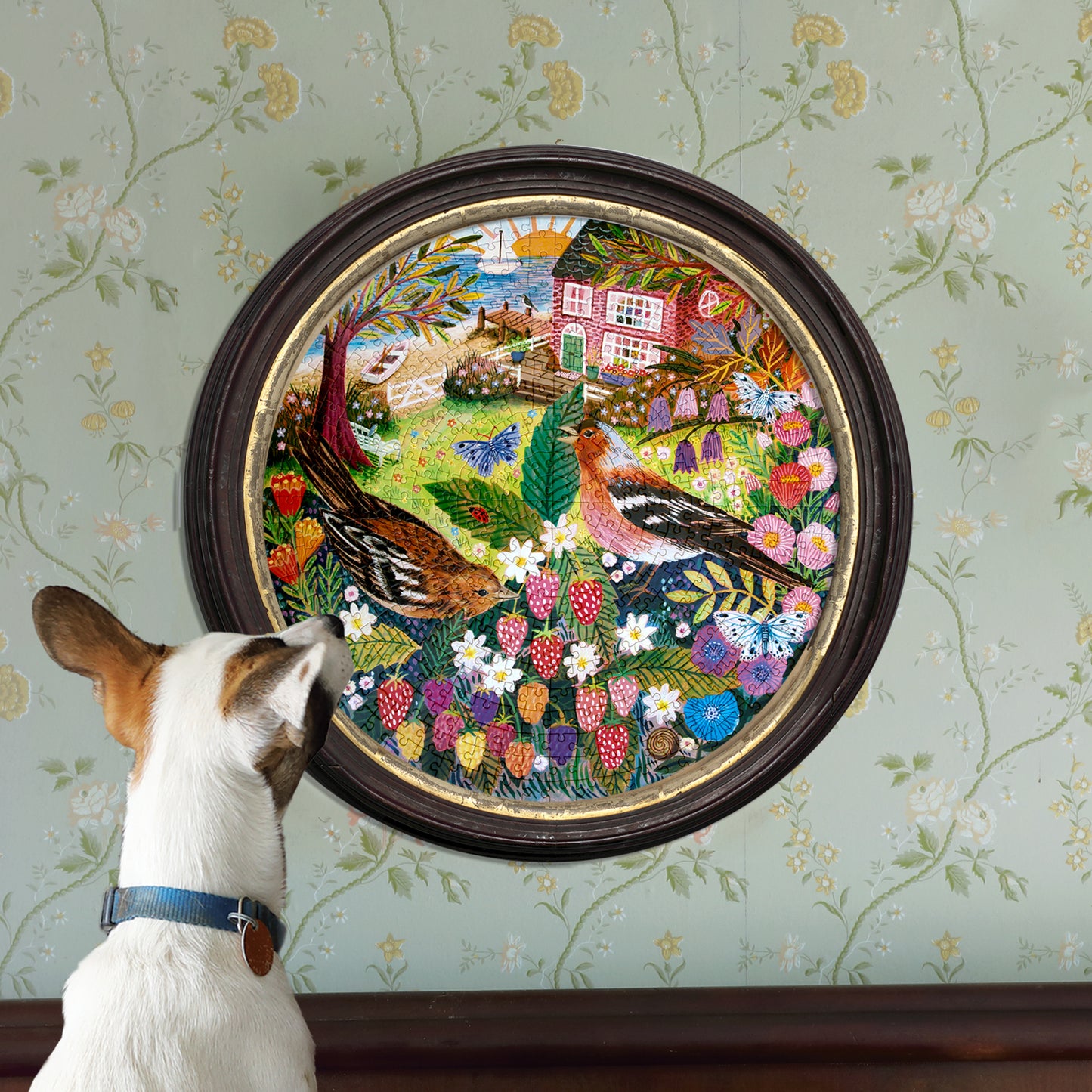 Birds By The Sea 500 pc Puzzle with colorful embroidered design featuring birds, flowers, and coastal cottage scene
