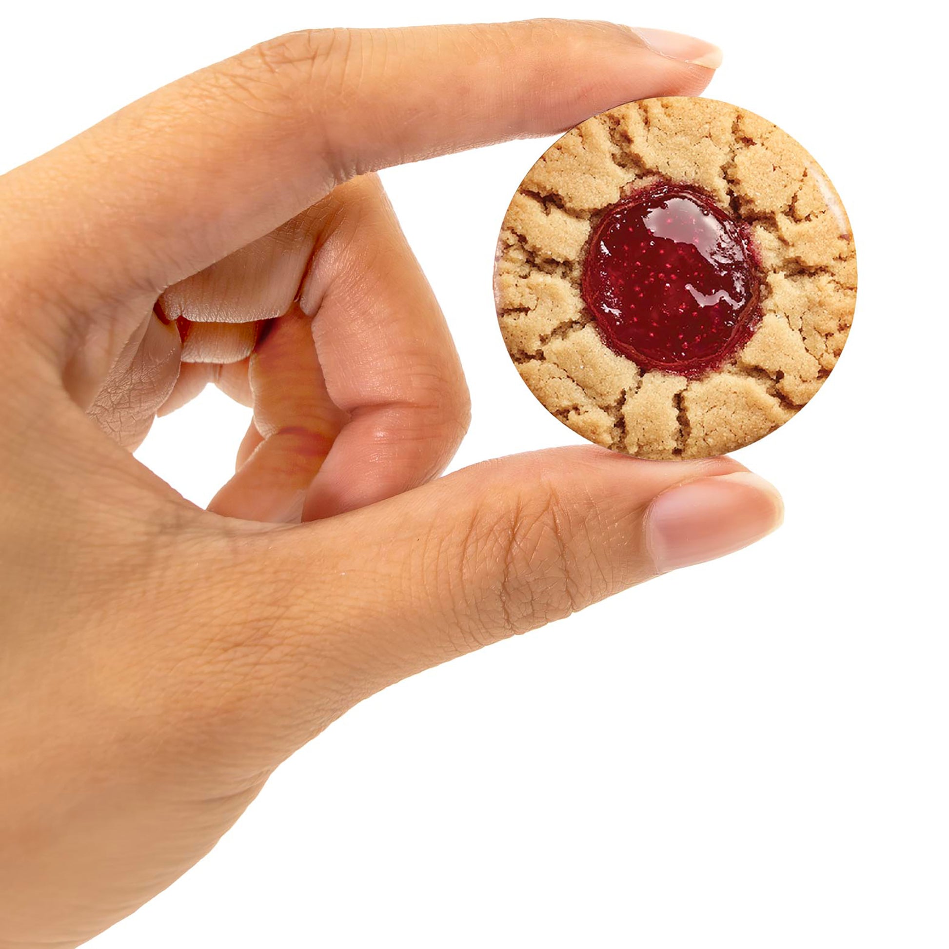 Snacks Alphabet jam-filled cookie toy with red center held in hand