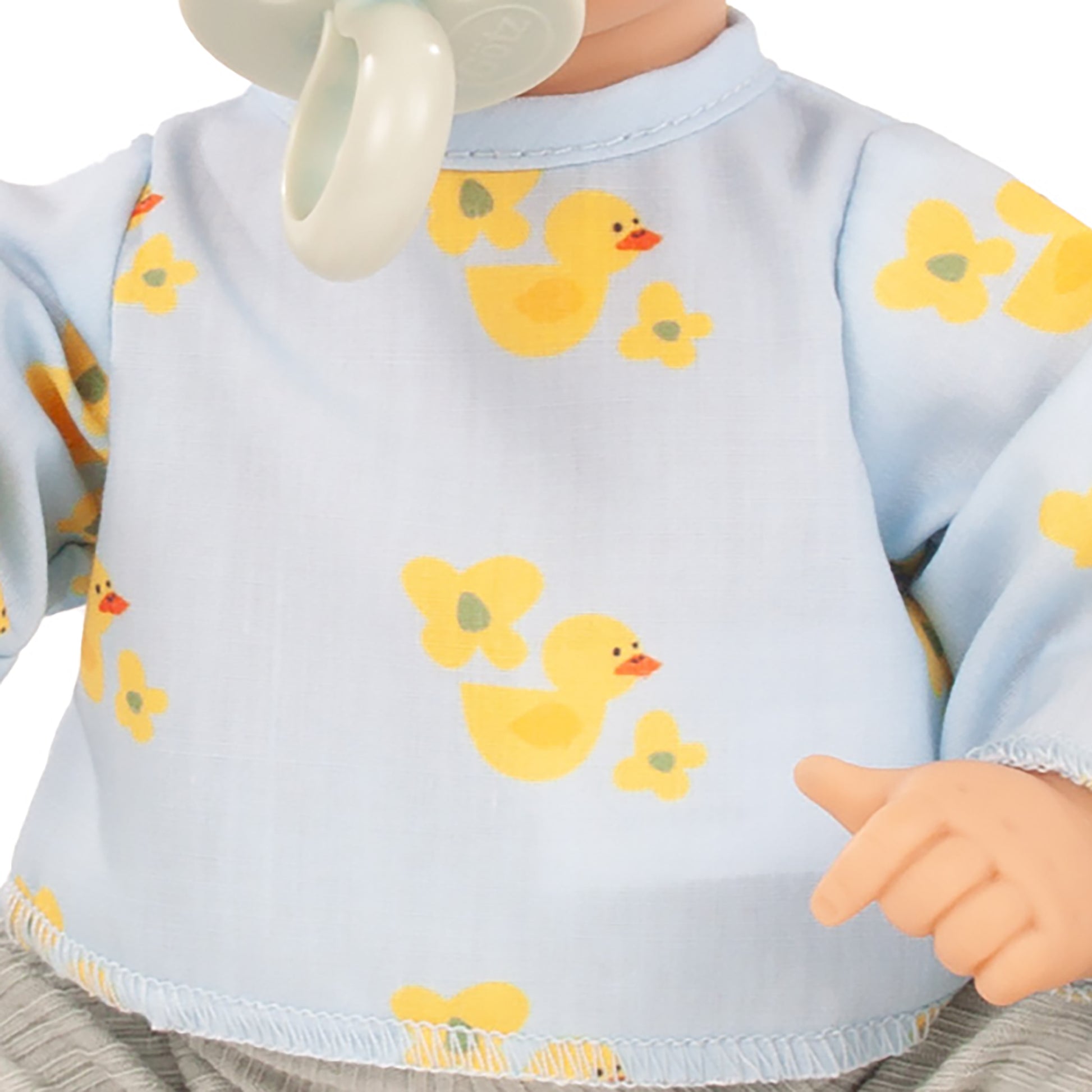 Gotz Sleepy Aquini Little Duck 13" doll wearing light blue duck print bib
