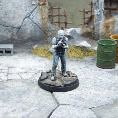 Fallout Wasteland Warfare Burned Man miniature figure with bandaged head and weathered clothing on base