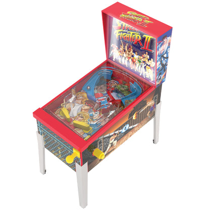 Street Fighter II Mini Arcade Pinball machine with red top, blue playfield, and yellow flippers