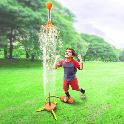Air Powered Bubble Rocket toy in orange and yellow launching bubbles outdoors