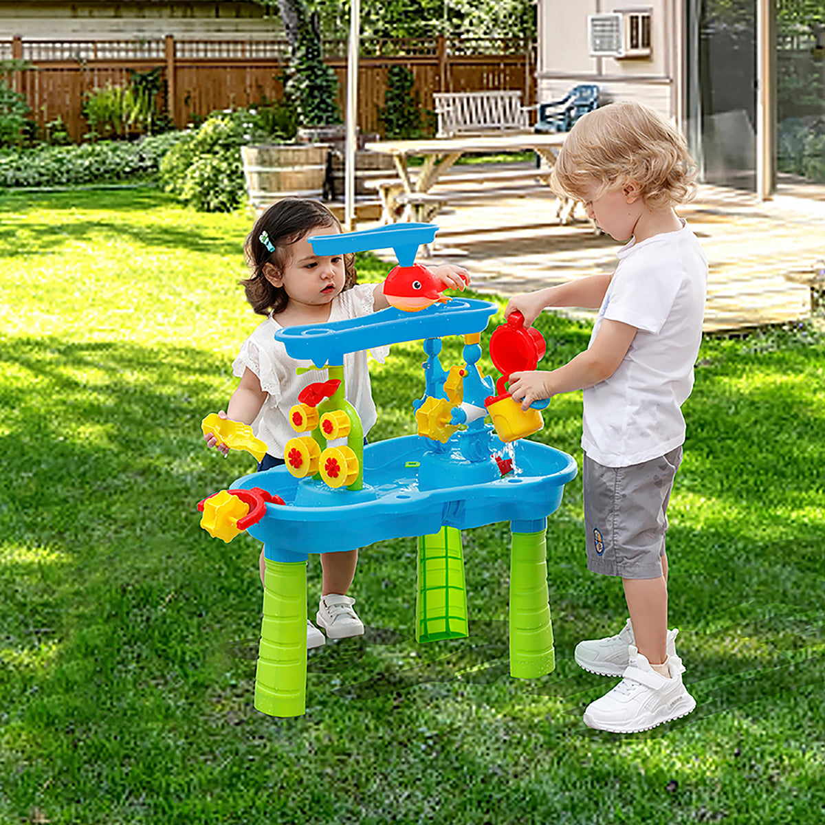 Trimate Sand & Water Table - 3 Tier with blue basin, green legs, and colorful accessories including watering can and ...