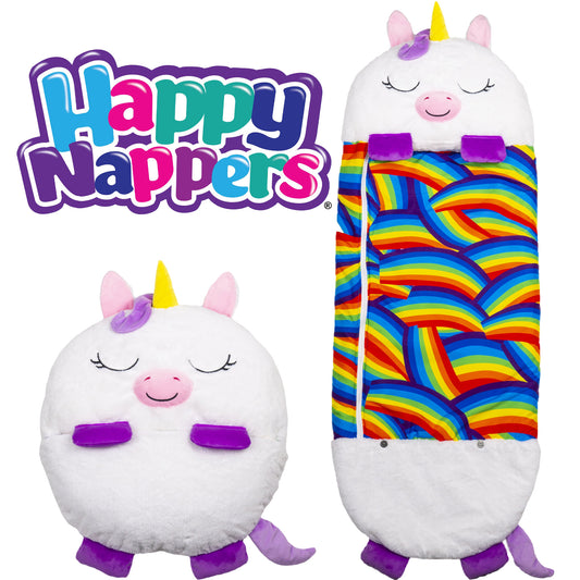 Happy Nappers white unicorn plush sleeping bag with yellow horn, pink ears, closed eyes, rainbow stripe pattern on sleeping bag section, and purple feet
