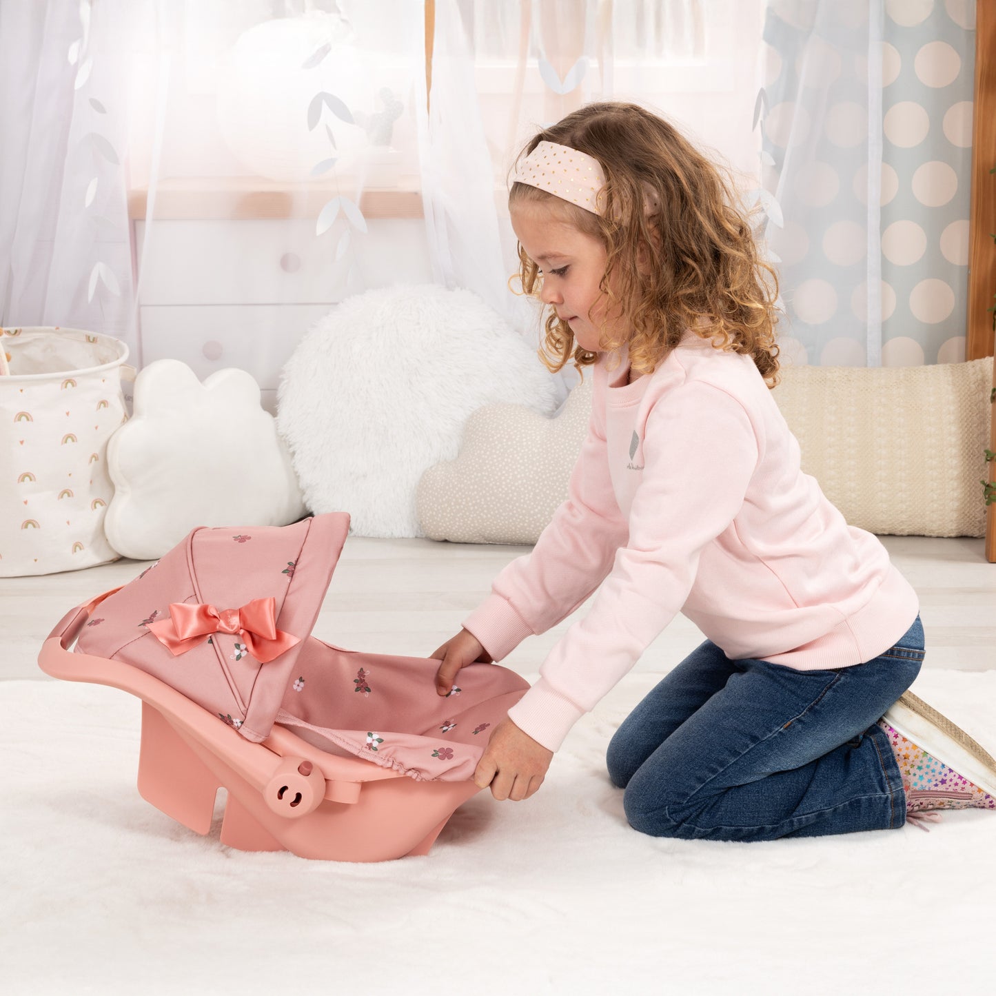 Bayer Design Deluxe Doll Car Seat in coral pink with floral pattern