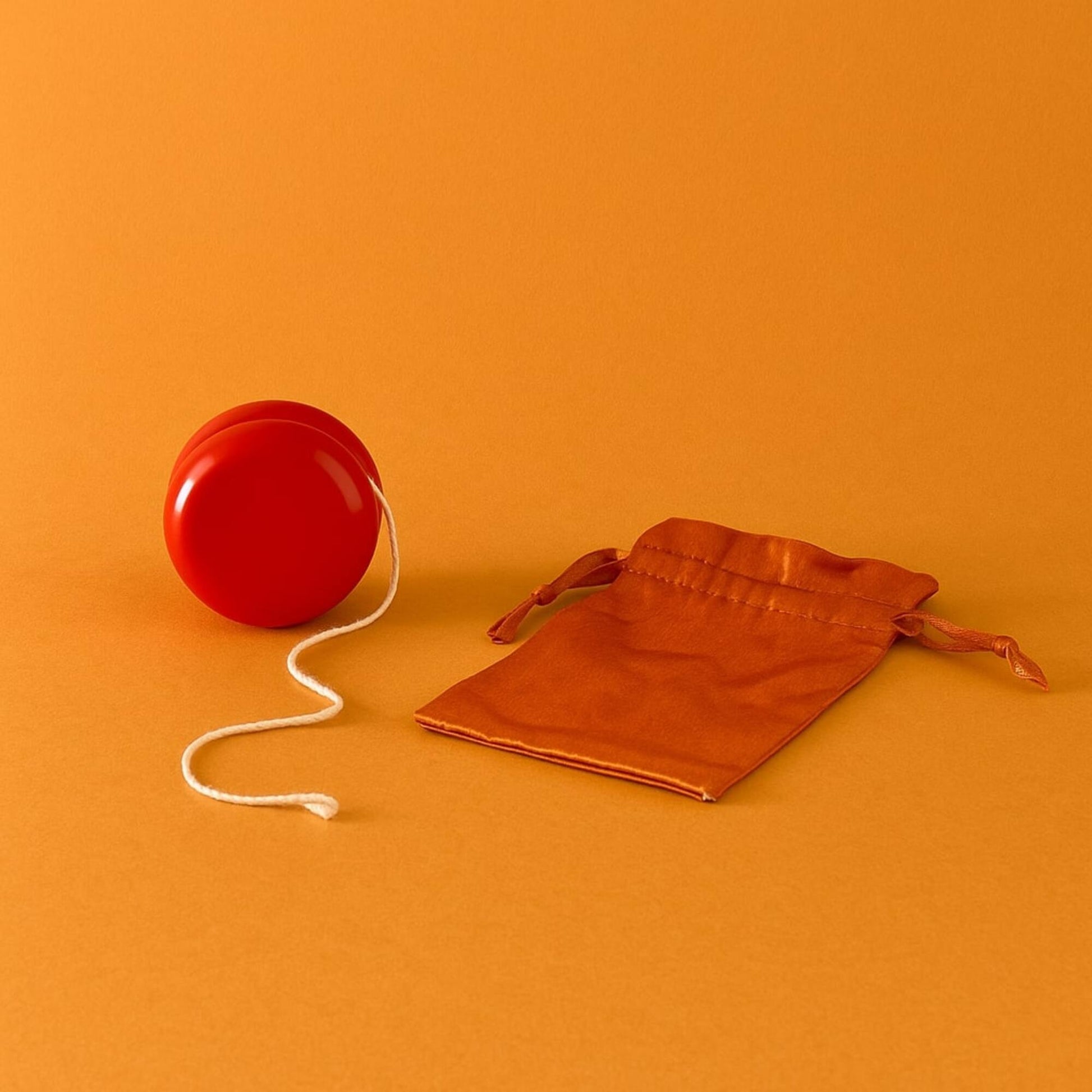 Hinkler Retro Box Learn Yoyo with red ball, white string, and orange storage pouch