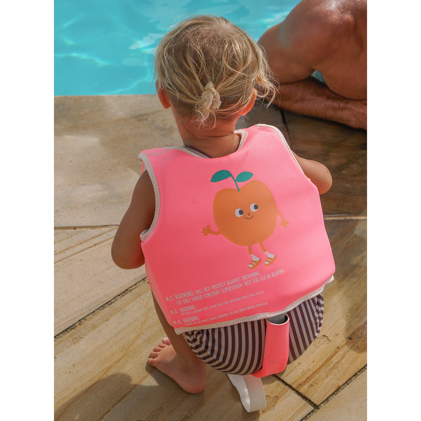 Sunnylife Poppy The Peach Float Vest in neon pink with orange peach design