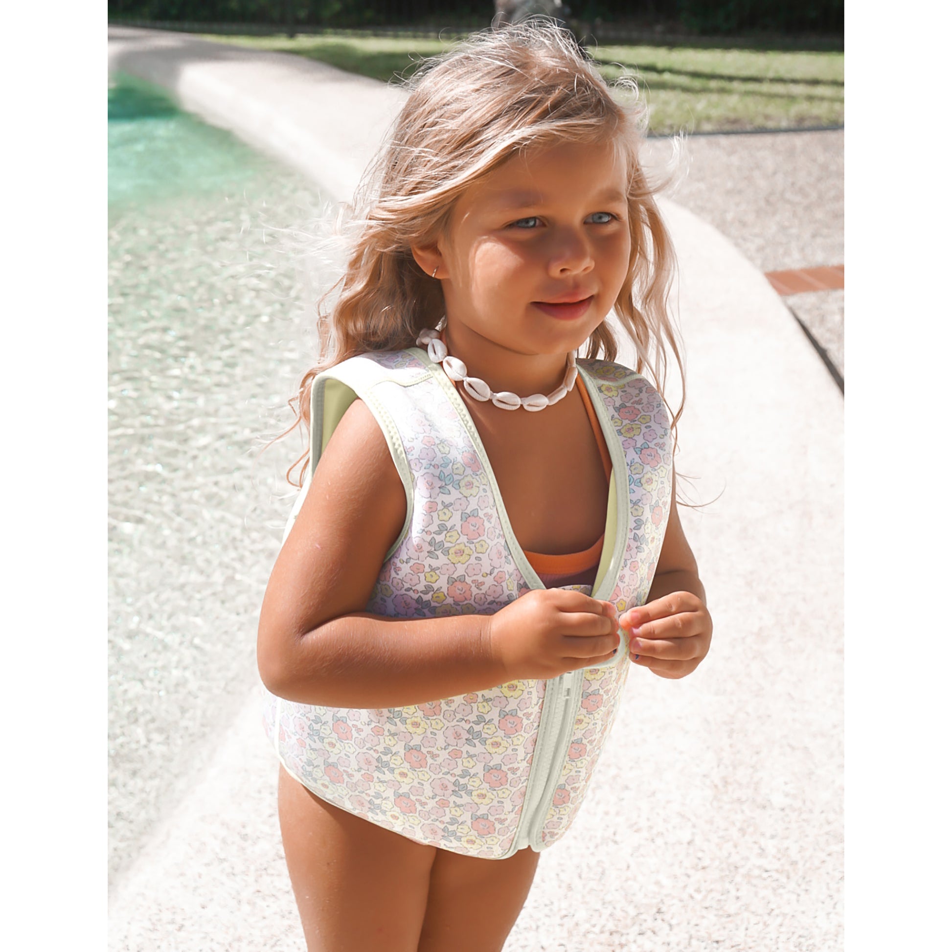 Float Vest 3-6 Into the Garden ditsy floral pattern with white trim