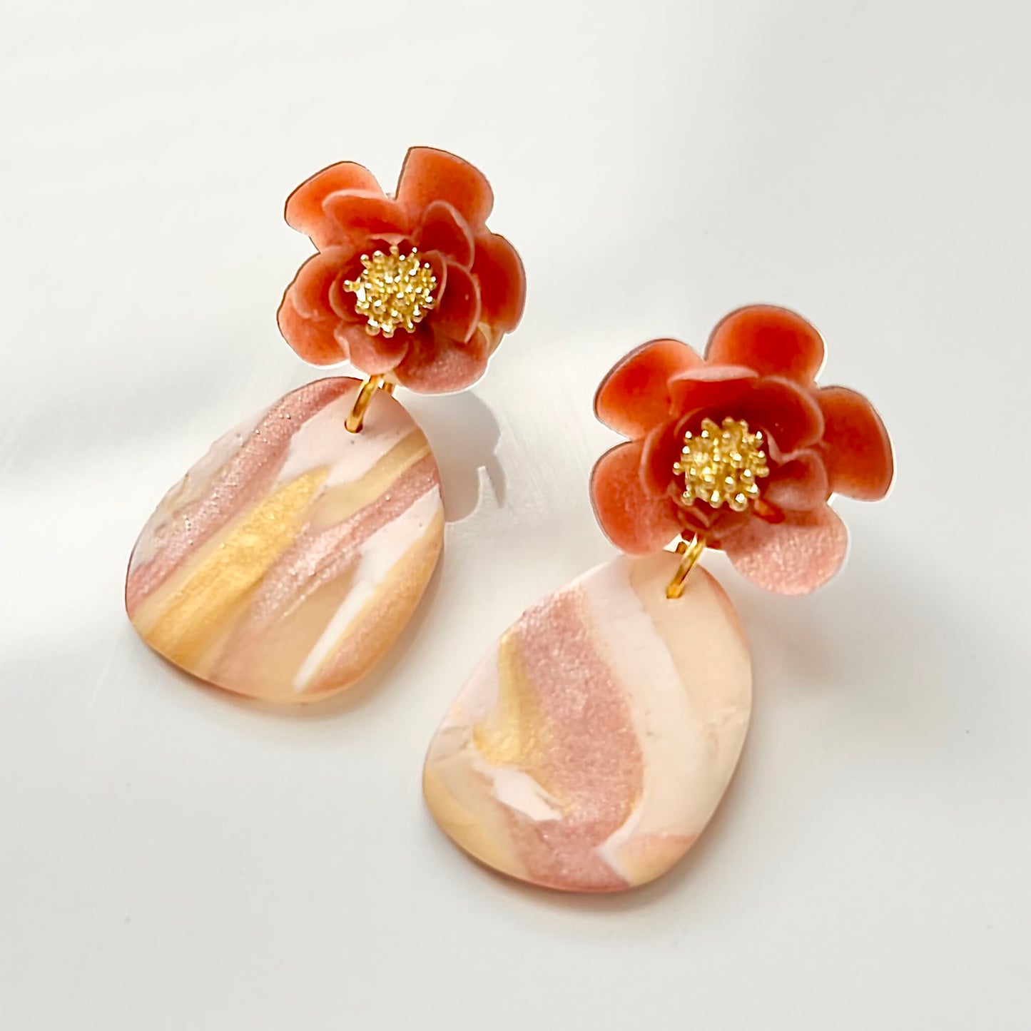 Sculpey Premo Clay Translucent 1lb shown as handmade flower earrings in coral and peach