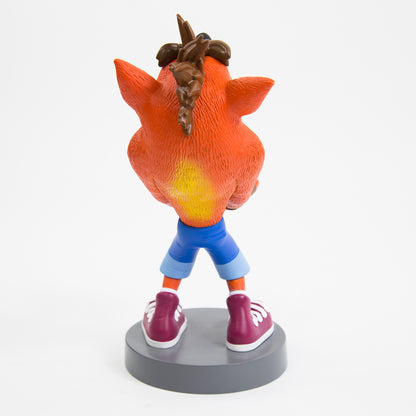 Crash Bandicoot Cable Guys phone holder figure with orange body and blue shorts