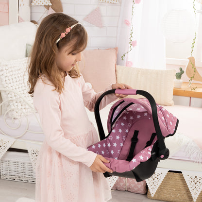 Bayer Design Deluxe Car Seat in pink with white stars pattern, held by child
