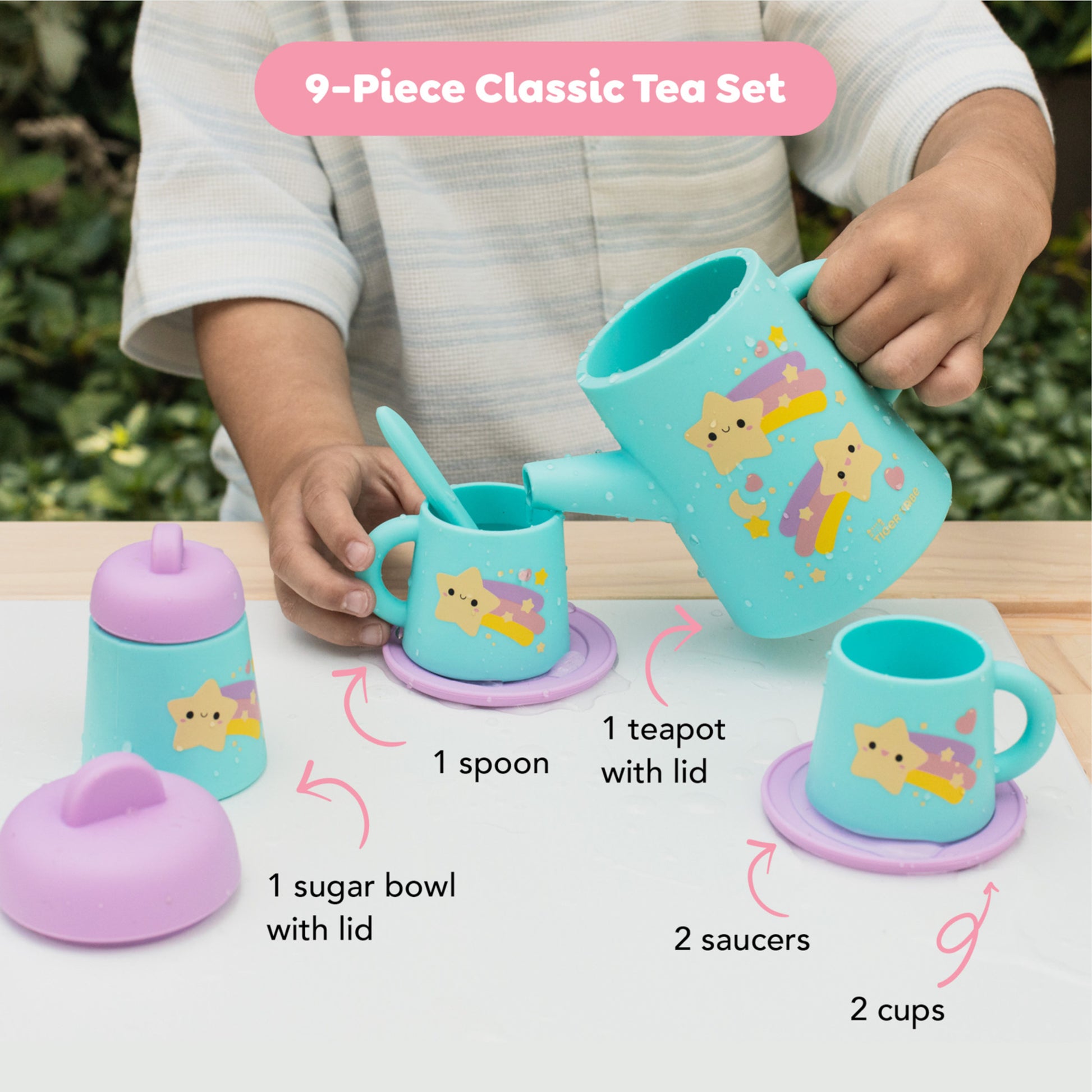 Tiger Tribe 9-piece silicone tea set in turquoise and purple with star designs, includes teapot, cups, saucers, sugar...
