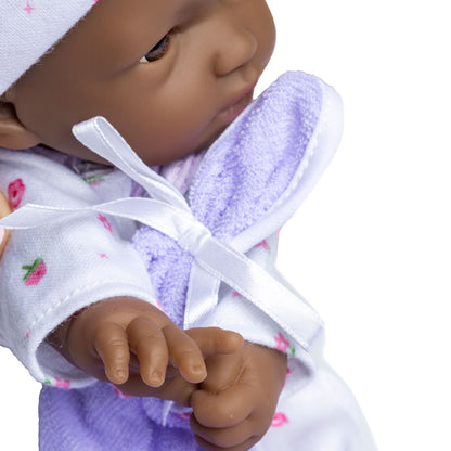 JC Toys La Baby African American doll in purple outfit with blanket and pacifier