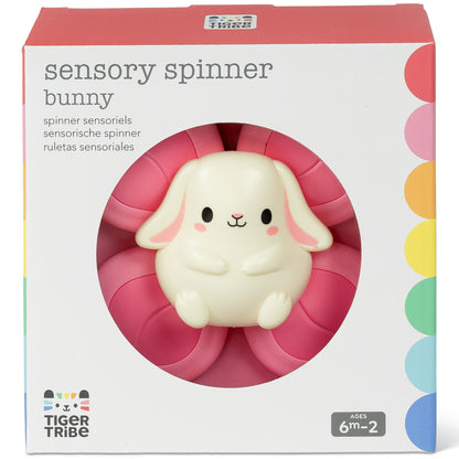 Sensory Spinner Bunny toy with white bunny character and pink spinning paddle wheel on packaging