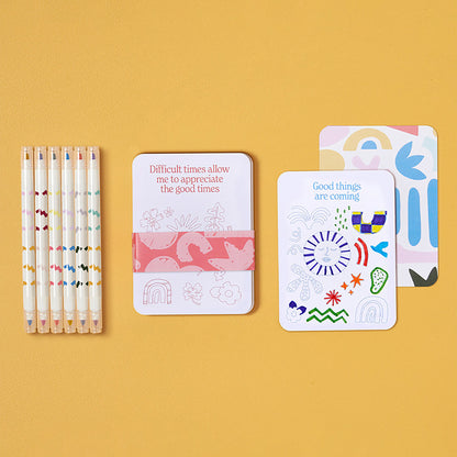 JOS Color Your Own Affirmation Cards set with markers and inspirational cards on yellow background