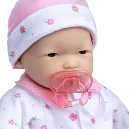 JC Toys La Baby Asian doll in pink floral outfit with pacifier and blanket
