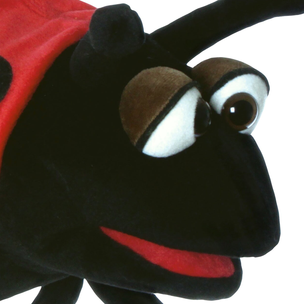 Living Puppets Trudy The Ladybug hand puppet with black body, white eyes, brown antennae, and red accents
