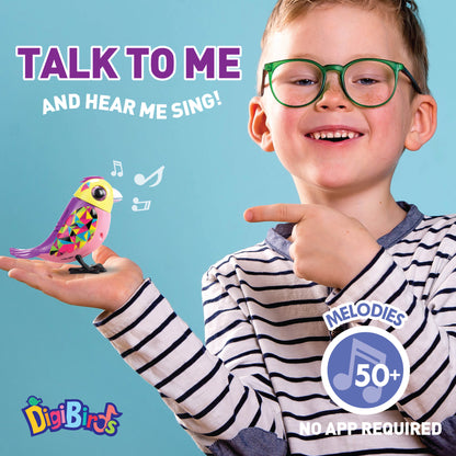 DigiBirds Interactive Singing Bird with colorful pink and purple bird featuring geometric patterns, shown in child's ...