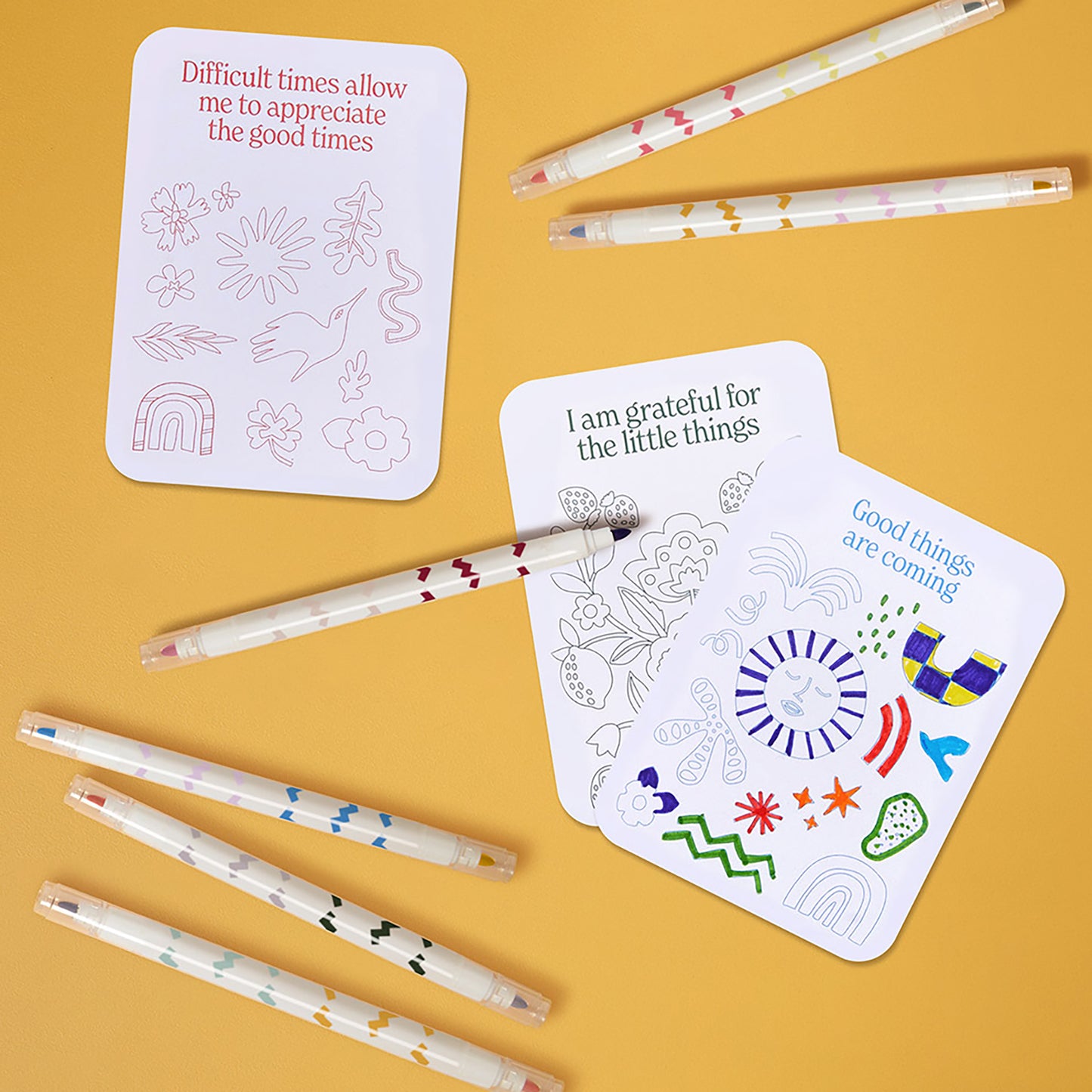 JOS Color Your Own Affirmation Cards with patterned markers on yellow background
