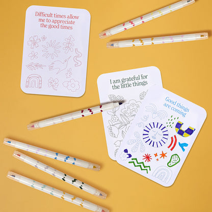 JOS Color Your Own Affirmation Cards with patterned markers on yellow background