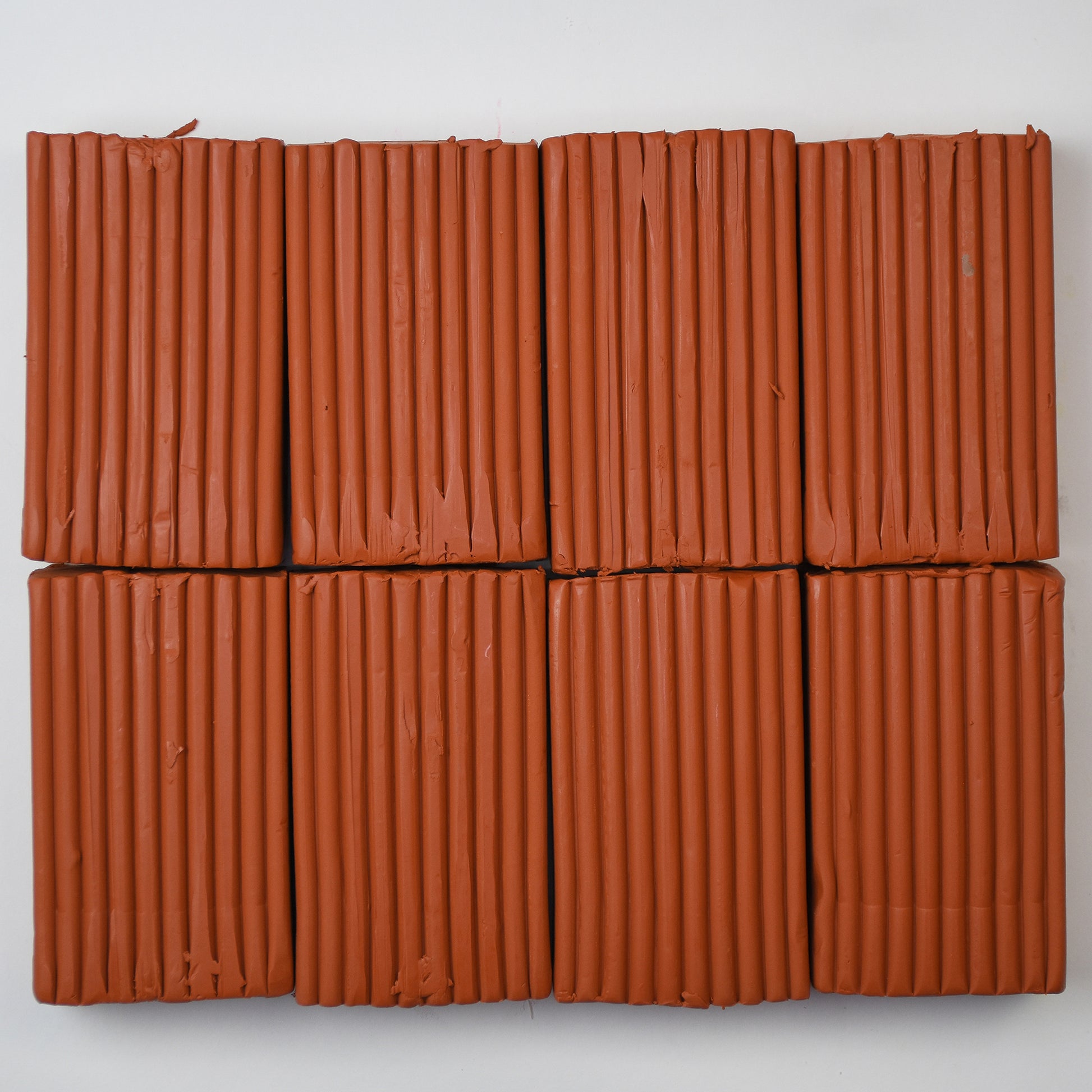 Original Sculpey Terra Cotta Clay 8lb pack showing eight orange clay blocks