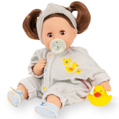 Gotz Cosy Aquini 13 inch baby doll with brown hair buns, pacifier, gray duck outfit, and yellow rubber duck toy