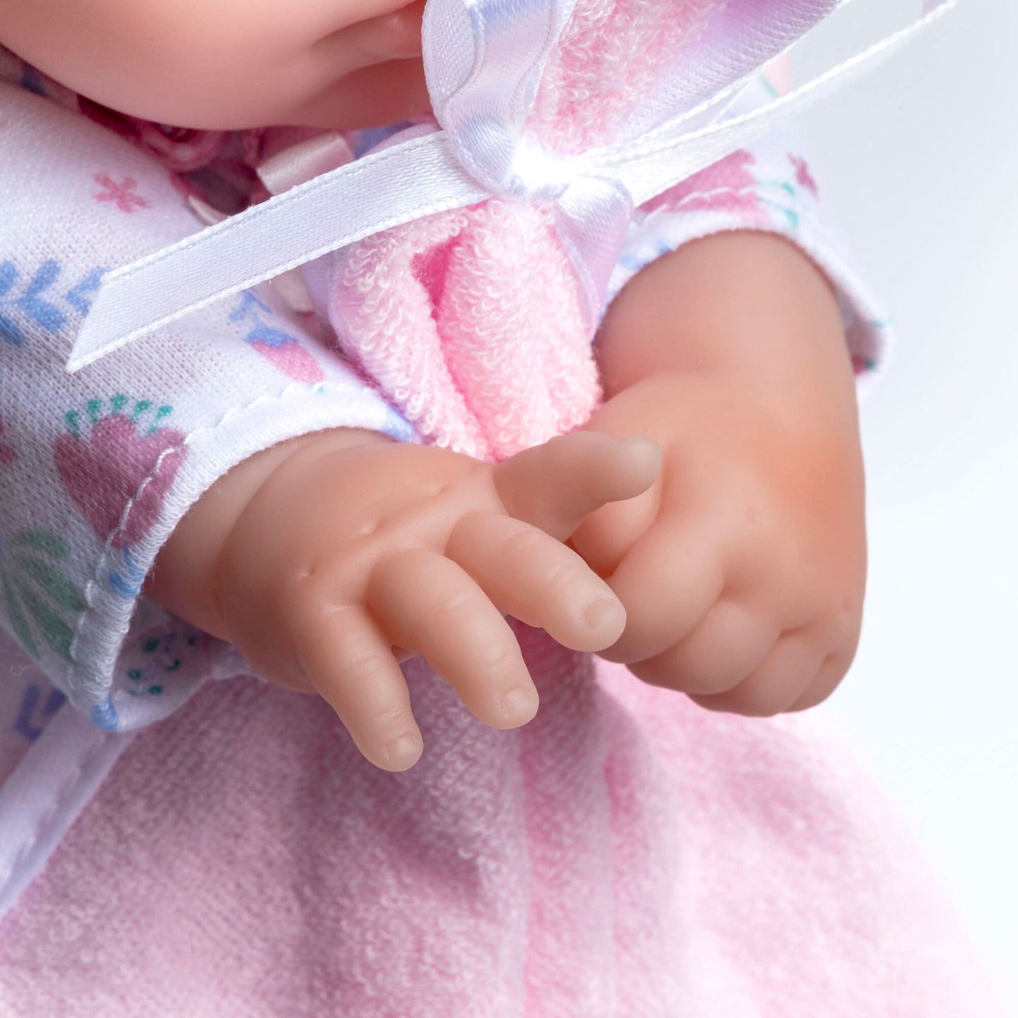JC Toys La Baby 11 inch soft body doll with pink and white outfit, blanket and pacifier
