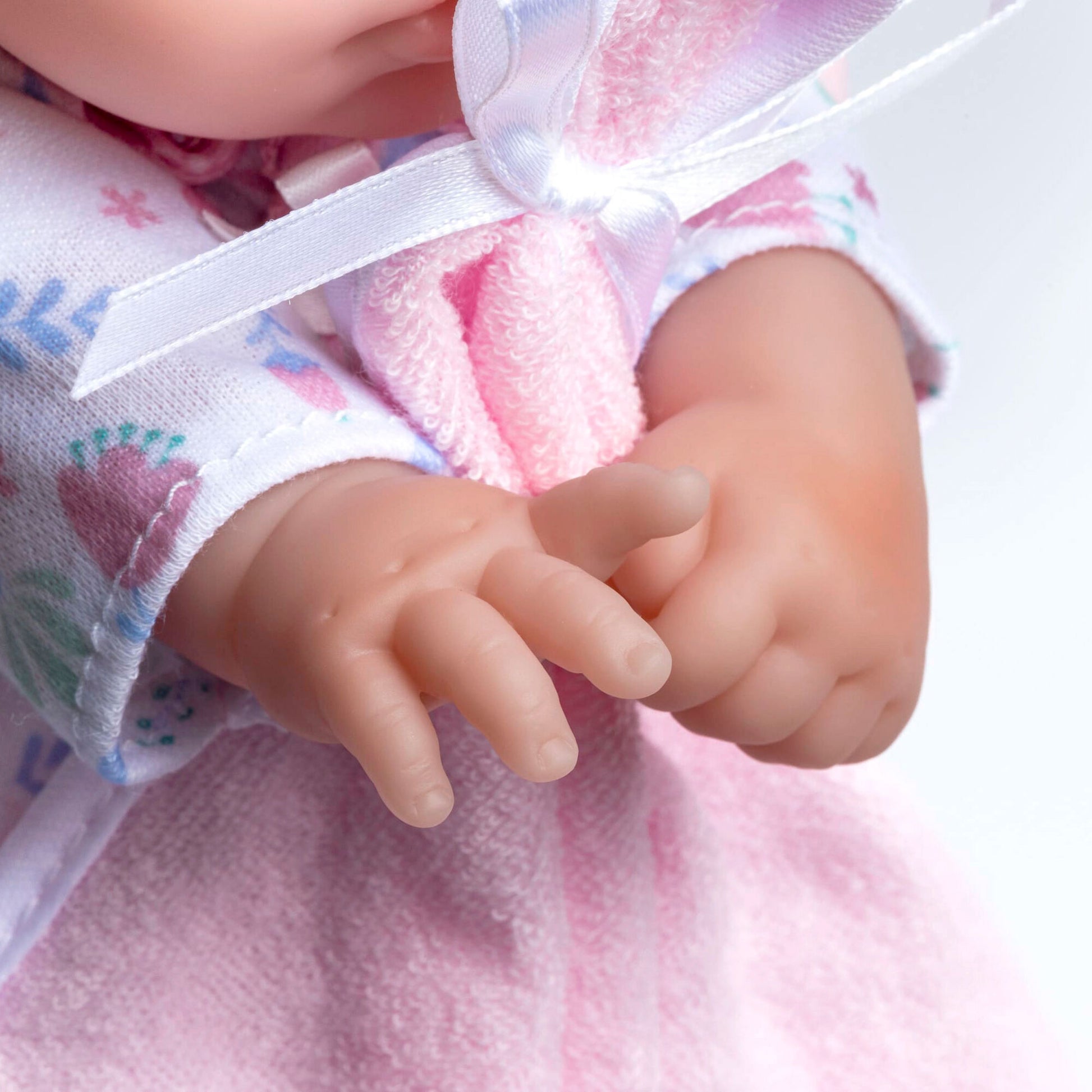 JC Toys La Baby 11 inch soft body doll with pink and white outfit, blanket and pacifier