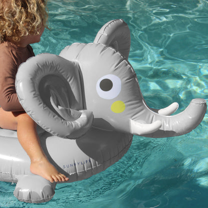 Sunnylife Eli The Elephant gray and white inflatable pool float with handles in swimming pool