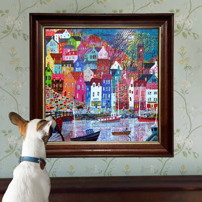 Piece&Love Scottish Isle 1000 pc puzzle featuring colorful harbor village with boats and houses
