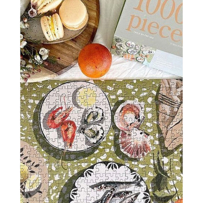 JOS 1000 Piece Puzzle - Table By The Sea with seafood and floral design
