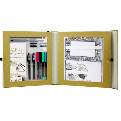 Sketch Plus Cards & Calligraphy kit open box showing calligraphy pens, brush markers in black, pink, green, and blue,...