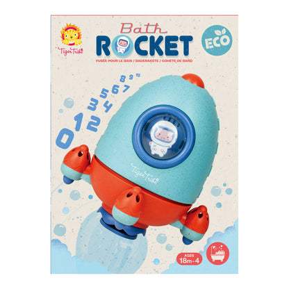 Tiger Tribe Bath Rocket ECO bath toy with turquoise body, red fins, and blue accents, featuring a small astronaut window, for ages 18 months to 4 years