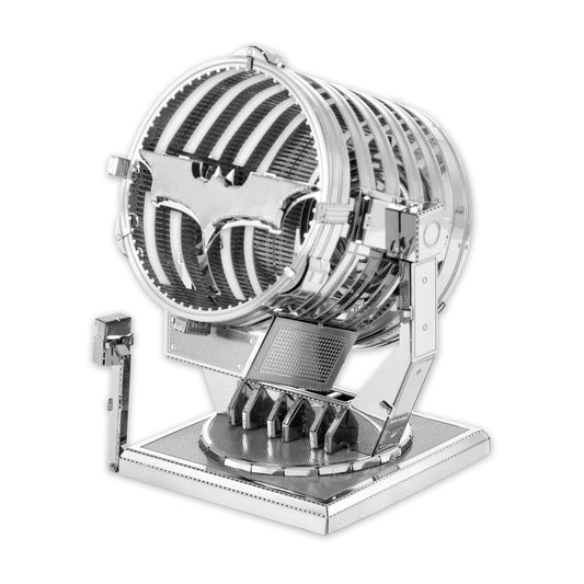 Metal Earth 3D metal model kit assembled as Batman Bat-Signal with rotating searchlight mechanism and base, shown on plain white background