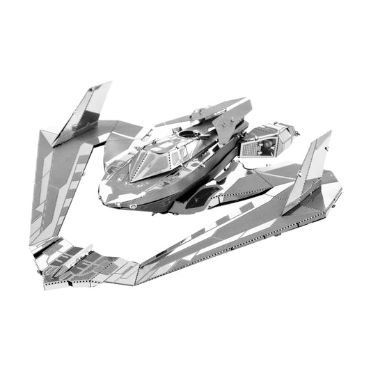 Metal Earth 3D metal model kit Batwing, silver-colored metal sheets with perforated details and fold lines, unassembled on plain background